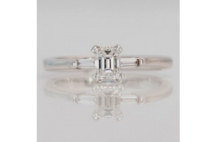 Emerald Cut Solitaire With Diamond Shoulders