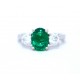 Emerald and diamond three stone ring