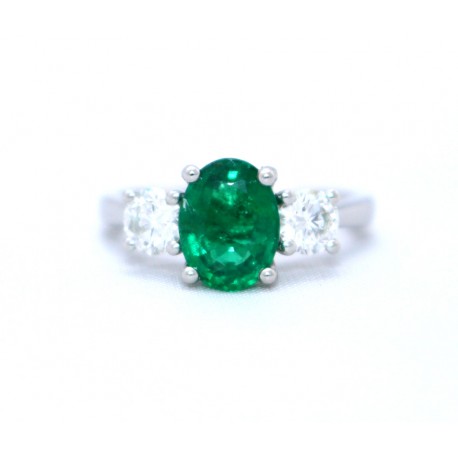 Emerald and diamond three stone ring