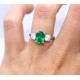 Emerald and diamond three stone ring