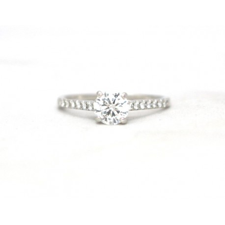 Diamond solitaire with diamond shoulders